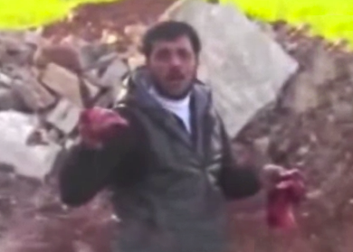 Un rebelde sirio arranca y come el corazón de un soldado muerto