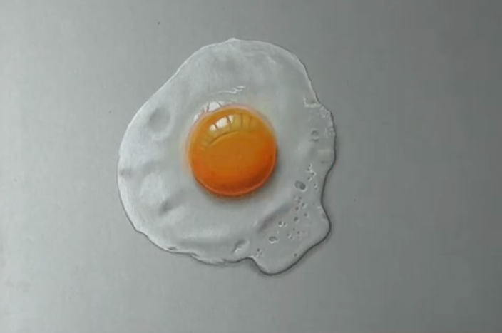 Esto es un dibujo de un huevo frito. Si, un dibujo