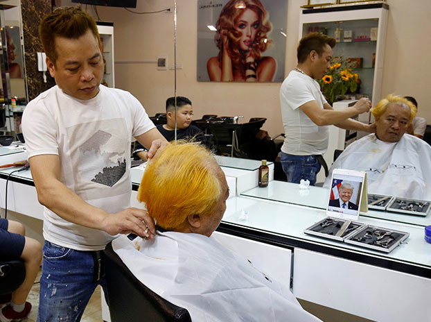 Una peluquería de Vietnam atiende gratis a los clientes que se quieran peinar como Trump o Kim Jong-un
