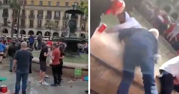 Un hincha del Liverpool tira a un turista y a un vendedor ambulante a una fuente en Barcelona