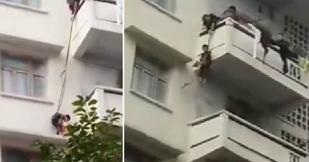 Una abuela descuelga a su nieto de 7 años por el balcón de un quinto piso para rescatar a un gato