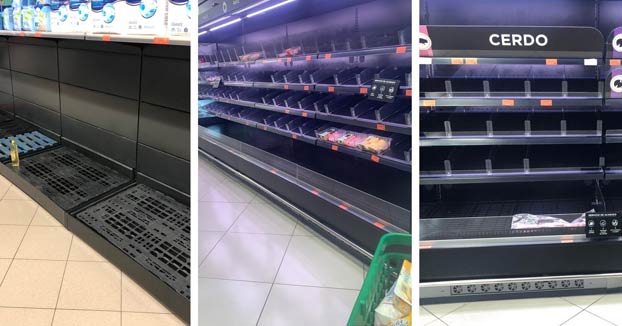 Largas colas y estantes vacíos en los supermercados de Madrid después del cierre de los colegios